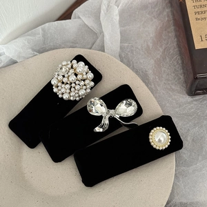 Three-piece black velvet hair clip set with pearls and rhinestones for elegant styling
