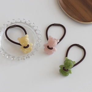 Dreiteiliges Set aus Gummibärchen-Haargummis in Bernstein, Rosa und Grün mit Gummiband