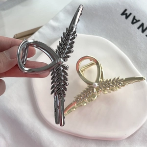 Elegant wheat stalk hair claw clip with rhinestones and pearl in gold and silver finish