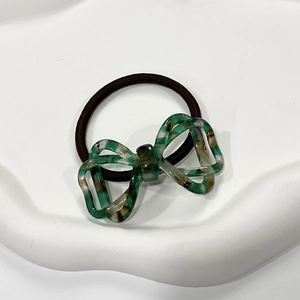 Elegant tortoise shell hollow bow hair tie with high elastic black rubber band for ponytail