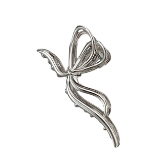 Sleek silver metal butterfly hair claw clip with ribbon design for thick hair