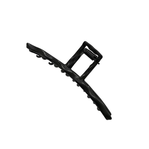 Minimalist black hair claw clip with glossy finish for elegant women hair styling