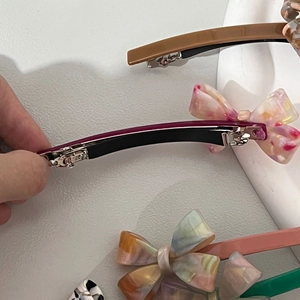 Barrettes à cheveux élégantes avec nœud en acétate aux couleurs marbrées pour coiffures vintage