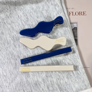 Elegant four-piece acetate hair clip set in blue and cream white for girls and women