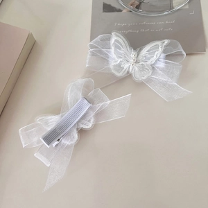 Elegant white mesh butterfly hair clips with lace embroidery and pearl accents