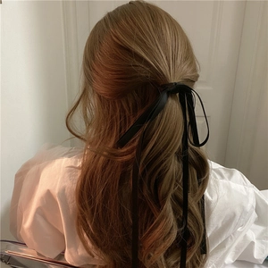 Elegant black long silk ribbon hair tie bow accessory for women's hairstyles