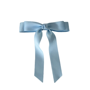 Elegant light blue satin double bow hair clip with long ribbons on white background