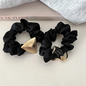 Elegant black satin hair scrunchies with gold geometric and heart metal charms