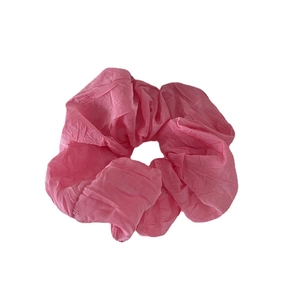 Elegant bright pink pleated mesh hair scrunchie with soft ruffled texture for women