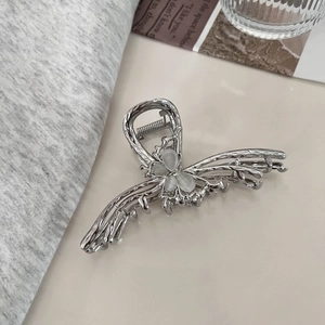 Elegant silver butterfly hair claw with opal accents and metal spring for women