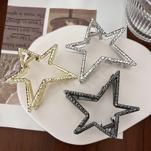 Pentagram star metal hair claw clips with hammered texture in gold silver and black