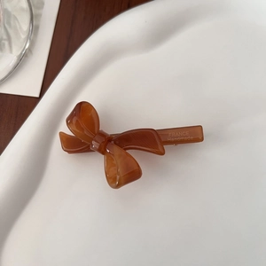 Tortoiseshell acetate bow hair clip with France Handmade engraving on ceramic plate