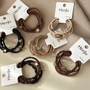 Elastic earth tone hair ties set with heart and flower charms for women and kids