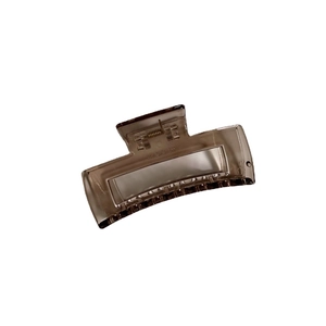 Translucent brown resin shark hair claw clip with large crisscross design for women