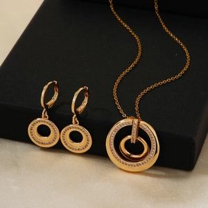 Elegant gold double circle necklace and earrings set with micro-pave crystals