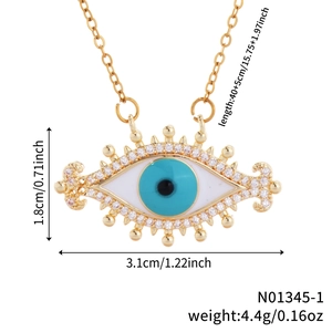Detailed view of evil eye necklace with gold plating and sparkling cubic zirconia stones