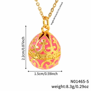 Pink Russian style egg pendant necklace with gold patterns and sizing specifications