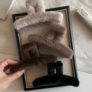 Minimalist large plush faux fur hair claw clips for women in four neutral colors