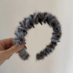 Serre-tête en peluche léopard bleu et marron avec des pointes gothiques noires