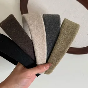 Five-pack of thick wool hairbands in earth tones including black, beige, and dark green