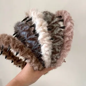 Serre-têtes en peluche à motif léopard en marron, bleu, blanc, gris et rose
