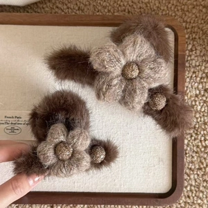 Brown plush flower hair claw clips with crochet details for autumn winter hairstyles