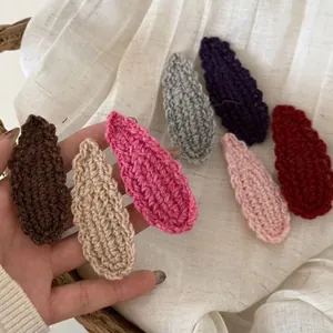 Set of 7 wave pattern wool knit water drop hair clips in assorted warm colors