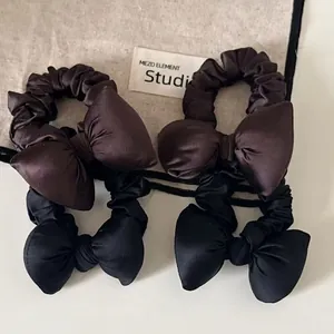 Set of 4 elegant satin bow hair scrunchies in black and dark chocolate brown colors
