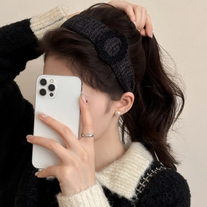 Elegant black tweed headband with camellia flower detail for high skull top hairstyle