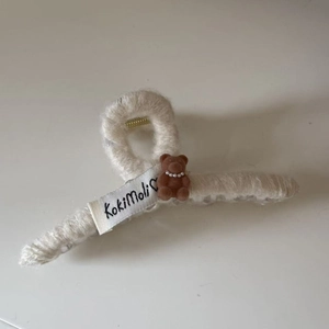 Cute white plush hair claw clip with brown teddy bear and pearl detail for women