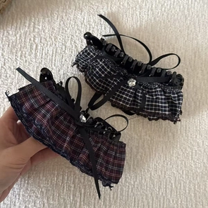 Set of two checkered bow banana hair clips with ruffles and floral rhinestones
