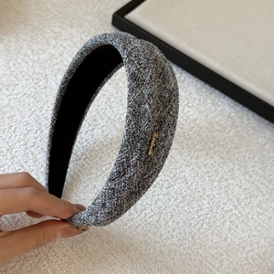 Retro grey tweed padded headband with gold metal handmade logo for a classy high crown look