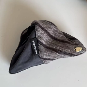 Elegant grey striped knitted hair claw clip with handmade tag and gold metal detail