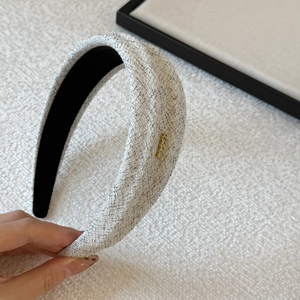 Vintage gray tweed padded headband with golden handmade label for a chic look