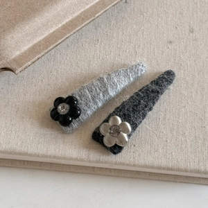 Elegant pair of silver metal floral plush hair clips with knitting and rhinestones