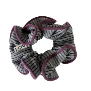 Gray and black striped knit scrunchie with purple velvet trim and LOVE tag detail