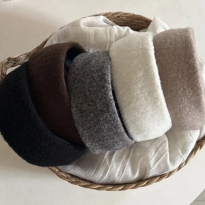 Plush wool blend wide headbands in five neutral colors for a stylish high crown look