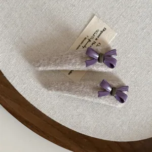 Creamy white and purple bow plush wool hairpin set for elegant side styling