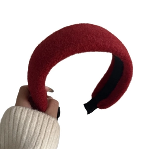 Thick red plush headband for women with warm faux fur texture and non-slip inner lining