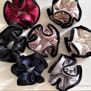 Seven-piece satin scrunchies set in assorted colors with elegant velvet piping detail