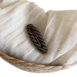Vintage Fair Isle plaid BB hair clip with wool pattern on a textured fabric background