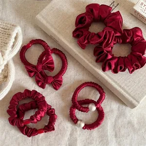 Set di elastici per capelli in raso rosso con fiocchi e perle per acconciature