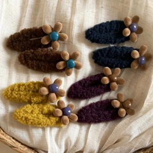 Plush flower hair clips set for women featuring 8 pieces in warm autumn and winter colors