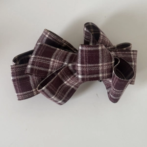 Brown and white checkered fabric layered bow hair clip with vintage banana clip design