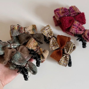 Tweed bow banana hair clip for women featuring elegant multi-layer fabric and strong grip