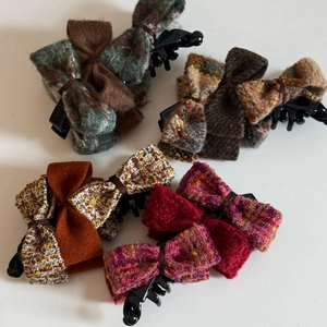 Bow hair clips in various plaid tweed fabrics and mixed colors for voluminous hairstyles