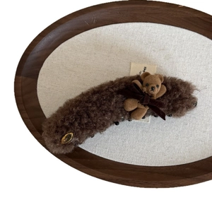 Pinza per capelli a forma di orsetto di peluche marrone con fiocco di raso
