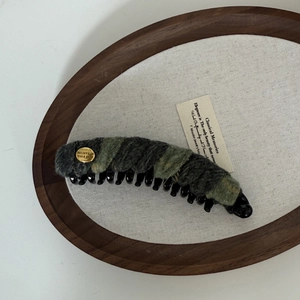 Vintage wool felt banana hair clip with golden label in deep grey and military green