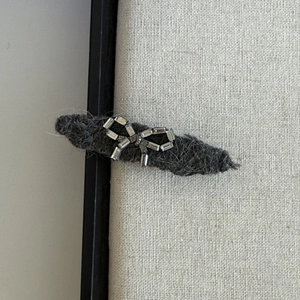 Elegant grey wool hairpin with sparkling rhinestone bow detail for women hair styling