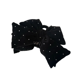 Elegant black velvet bow hair claw clip with silver rhinestones on a white background